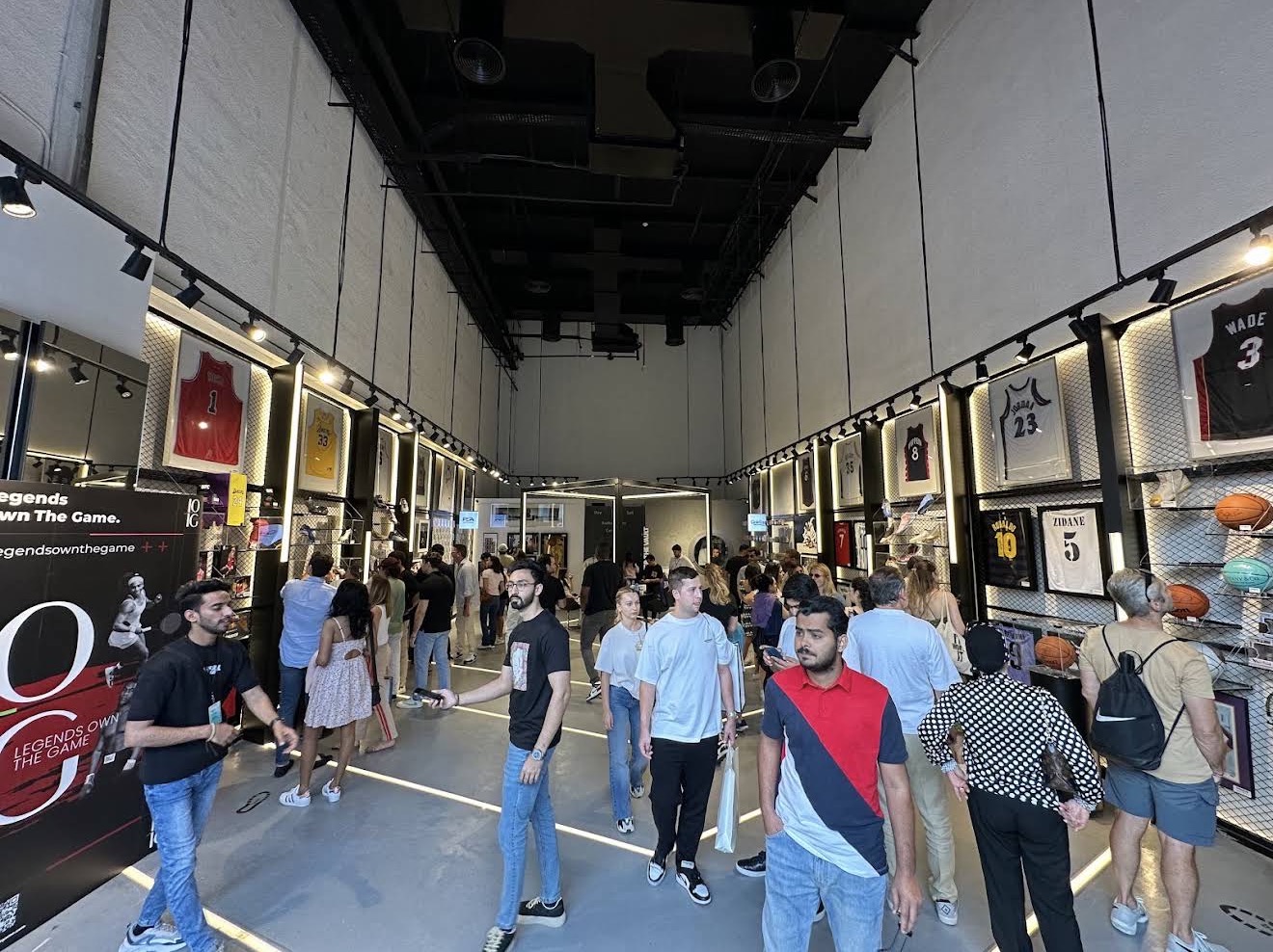 Collectors gathering inside Legends Own the Game